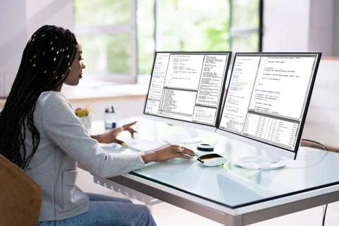 Computer Programmer Writing Program Code On Computer Stock Photos