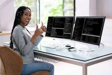 Computer Programmer Writing Program Code On Computer Foto stock