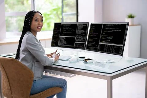 Computer Programmer Writing Program Code On Computer Stock-Fotos