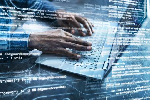 Computer Programmer Writing Program Code On Computer Photos