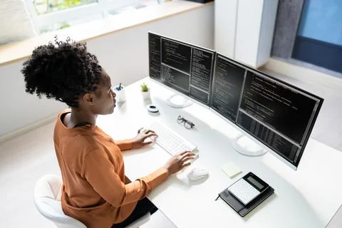 Computer Programmer Writing Program Code On Computer Photos