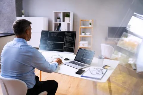 Computer Programmer Writing Program Code On Computer 스톡 사진