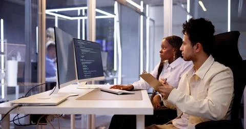 Computer Programmer Writing Program Code On Computer 写真素材