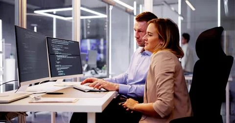 Computer Programmer Writing Program Code On Computer 스톡 사진