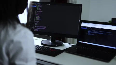 Computer programmers type and write code on the keyboard Stock Footage 168967257