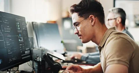 Computer, programming and web development with coder man in creative workplace 写真素材