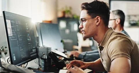 Computer, programming and web development with man in creative workplace for 写真素材