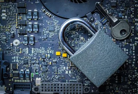 Computer protection. Data protect with padlock, key on microscheme chip Foto stock