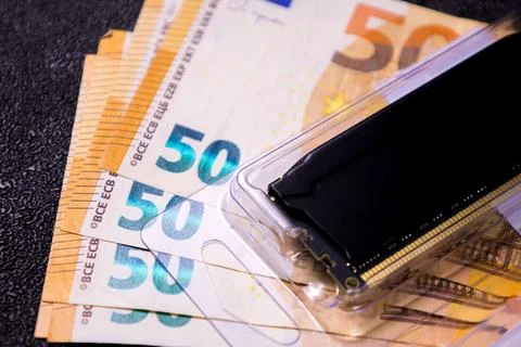 Computer ram module on euro banknotes Stock Photos