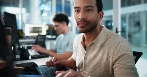 Computer, reading and smile of programmer man at desk in office for coworking or Stock Footage 309054410