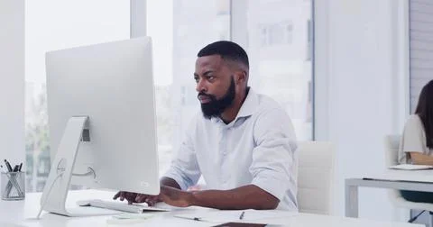 Computer, reading and typing with designer man in workplace for online plan.. Stock Photos