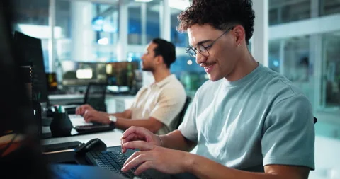Computer, reading and typing with happy man programming in office as graphic Stock Footage 309052346