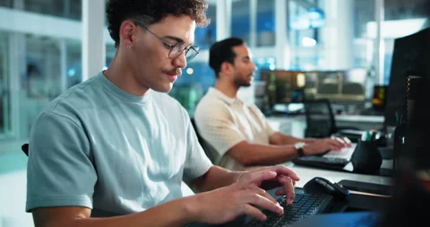 Computer, reading and typing with man at desk in office as programmer for Stock Footage 309142574