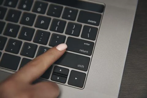 Computer with red hearts on table close up Stock Photos