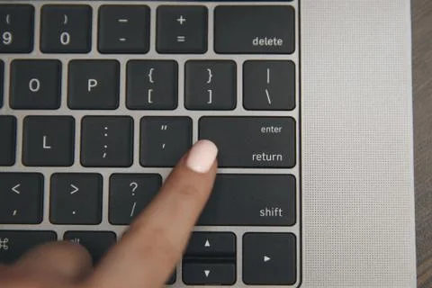 Computer with red hearts on table close up Stock Photos