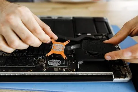 Computer repair concept Close-up view.Hardware. clearing notebook Fotos Stock
