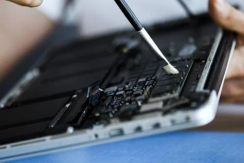 Computer repair concept Close-up view.Hardware. clearing notebook Фото