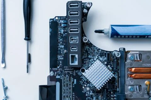 Computer repair hardware technology. Technician electronic pc service from en Stock Photos