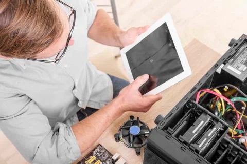 Computer repair professional. Stock Photos