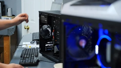 Computer repair shop fixing a PC Stock Footage 112098155