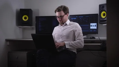 Computer to the room. The person with points and the laptop on a hand, tries to Video stock 72457186