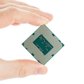  Computer s processor in hand isolated on a white background Computer s pr... Stock Photos