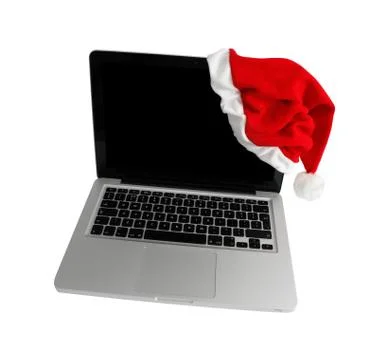 Computer with santa hat Stock Photos