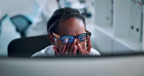 Computer, science and black woman with eye strain, research and headache with Stock Footage 319628497