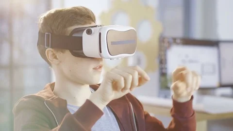 In a Computer Science Class Boy Wearing Virtual Reality Headset  Stock Footage 75784807