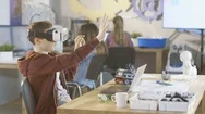 In A Computer Science Class Boy Wearing Virtual Reality Headset. Stock Footage