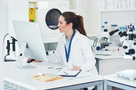 Computer, scientist and professional in science laboratory for medical research Stock Photos