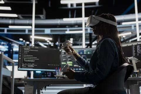 Computer scientist in data center using VR headset run artificial intelligence Stock Photos