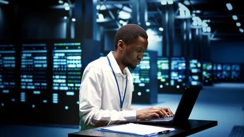 Computer scientist fixing server issues 스톡 사진