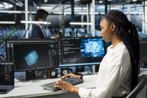Computer scientist in high tech data center managing AI training datasets Stock Photos