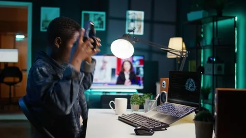 Computer scientist at home updating artificial intelligence neural networks Stock Footage 319522626