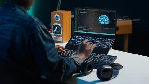 Computer scientist at home updating artificial intelligence neural networks Foto stock