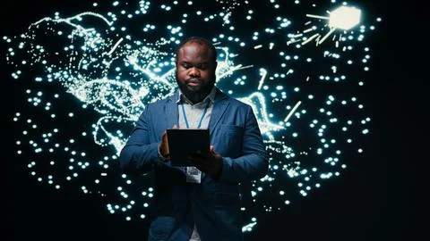 Computer scientist optimizes neural network neurons map with tablet Stock Photos