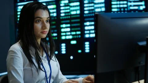 Computer scientist overseeing data center, making improvements Stock Photos