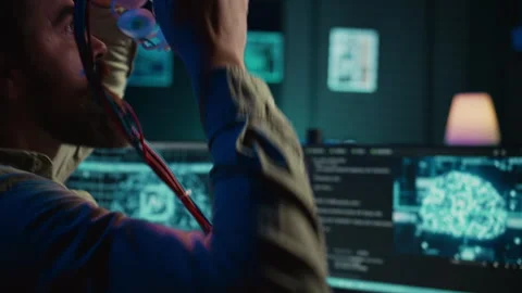 Computer scientist puts EEG headset on, links brain to cyberspace Stock Footage 266949426