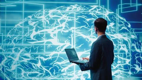 Computer scientist solving tasks on laptop, running AI programming Stock Photos