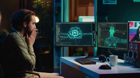 Computer scientist surprised by artificial intelligence greeting him unprompted Stock Footage 266953353