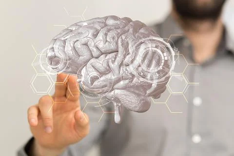 A computer scientist tapping on a 3D rendering of a brain hologram, enabling  Fotos de archivo