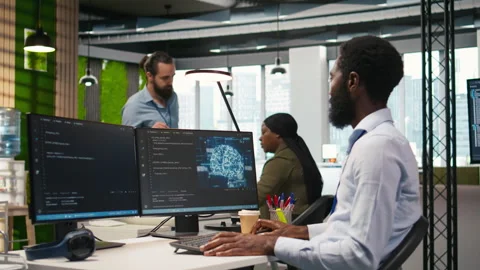 Computer scientist using AI on computer to optimize performance Stock Footage 313016014