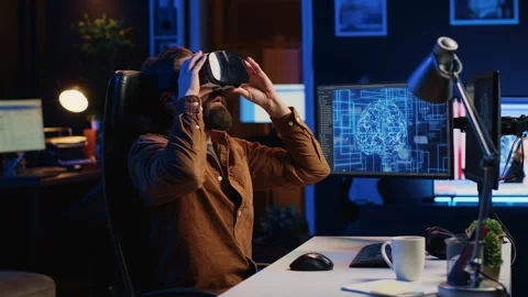 Computer scientist wearing VR glasses panicking after AI gains omniscience Stock Footage 265515256