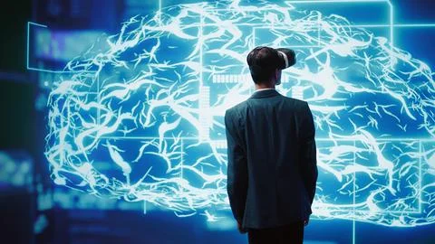 Computer scientist wearing VR headset interacting with AI visualization Stock Photos
