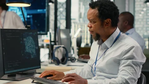 Computer scientist working in AI startup trains predictive models Stock Footage 323405212