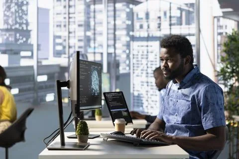 Computer scientist working with machine learning tech advancing AI 写真素材