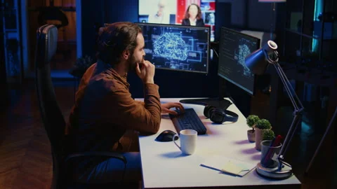 Computer scientist writes code on PC to visualize AI neural networks Stock Footage 265506703