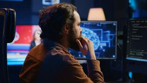 Computer scientist writes code on PC to visualize AI neural networks Stock Photos