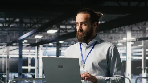 Computer scientists on data center platform analyzing performance outputs Video stock 310276750
